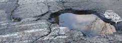 Pothole in road