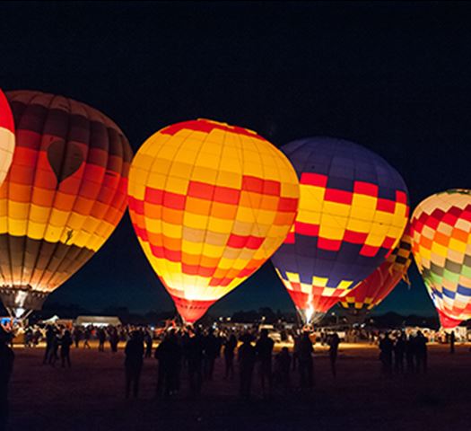 Hot air ballons taking off in the early morning